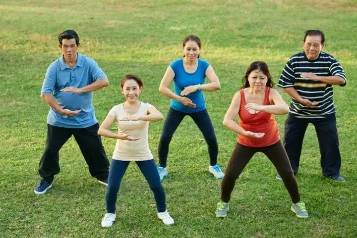 Group of Aged People Doing Tai Chi Outdoor