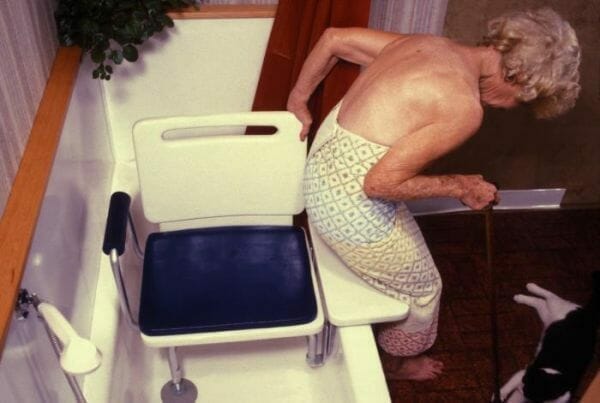 A shower transfer bench can be useful to help bathe an elderly person