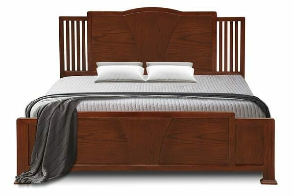 You may need bed risers for a low wooden bed like this one
