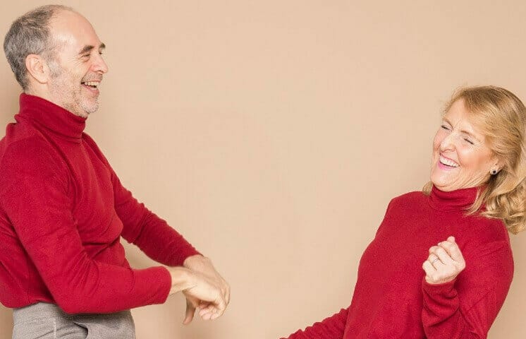 couple in red sweater dancing together