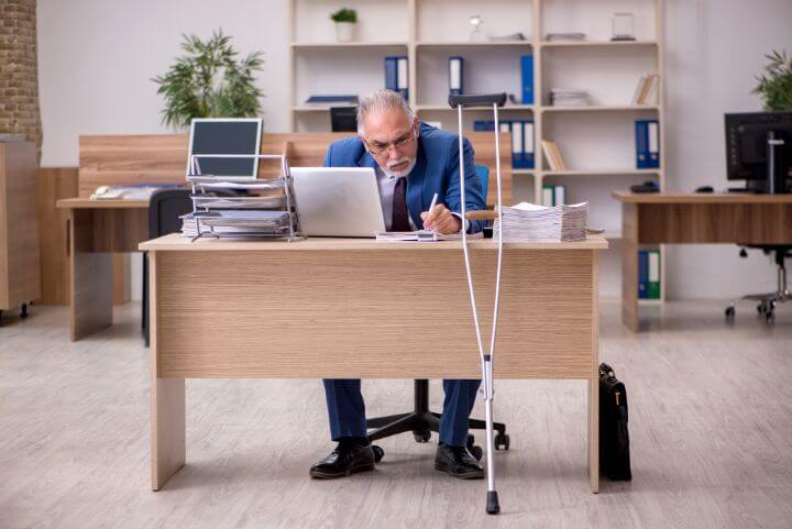 senior businessman sitting in his office