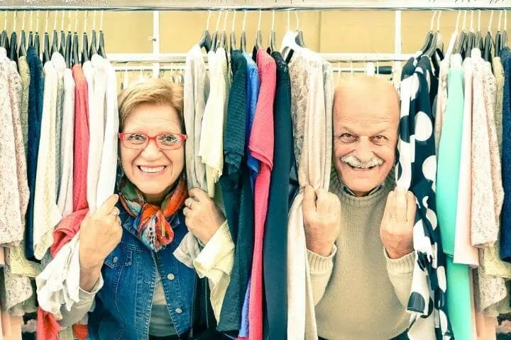 senior couple shopping for clothes
