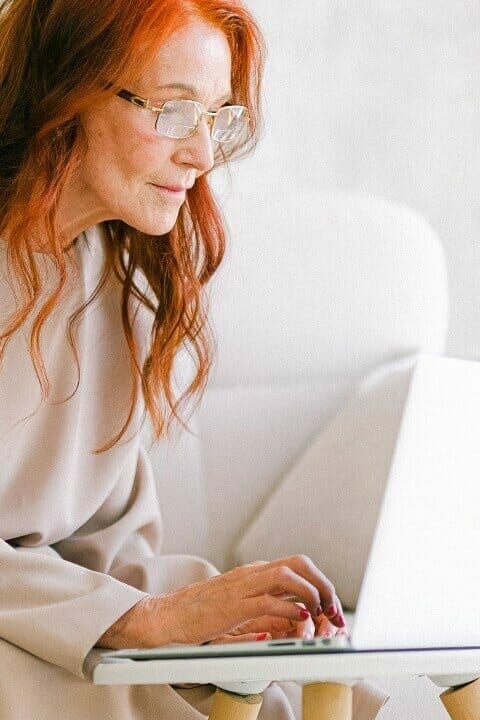 senior woman using laptop