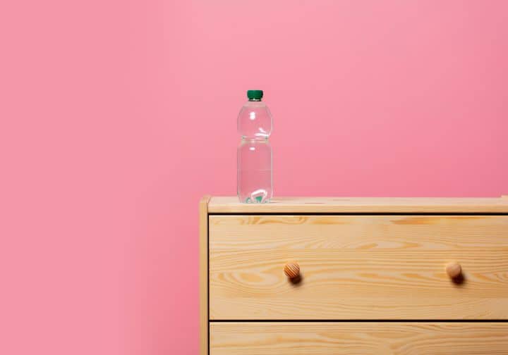 water bottle on bedside table