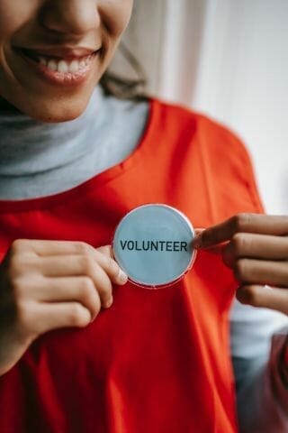 wearing volunteer badge